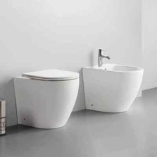 SANITARI A TERRA TAURUS FILO MURO SCARICO VORTEX WC BIDET Rallentata Coprivaso