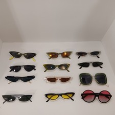 Lot of 12; 10 Pair Of Cat Style Sunglasses And 2 Pair Of Misc Style Sunglasses