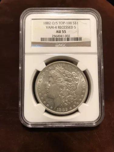 1882 O $1 NGC Graded AU 55 (Top-100, VAM-4) O/S Recessed S 2564941-002 Morgan