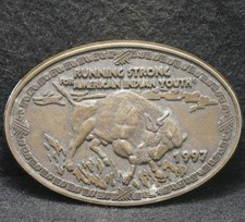 XC15136 VINTAGE 1997 RUNNING STRONG FOR AMERICAN INDIAN YOUTH MENS BELT BUCKLE