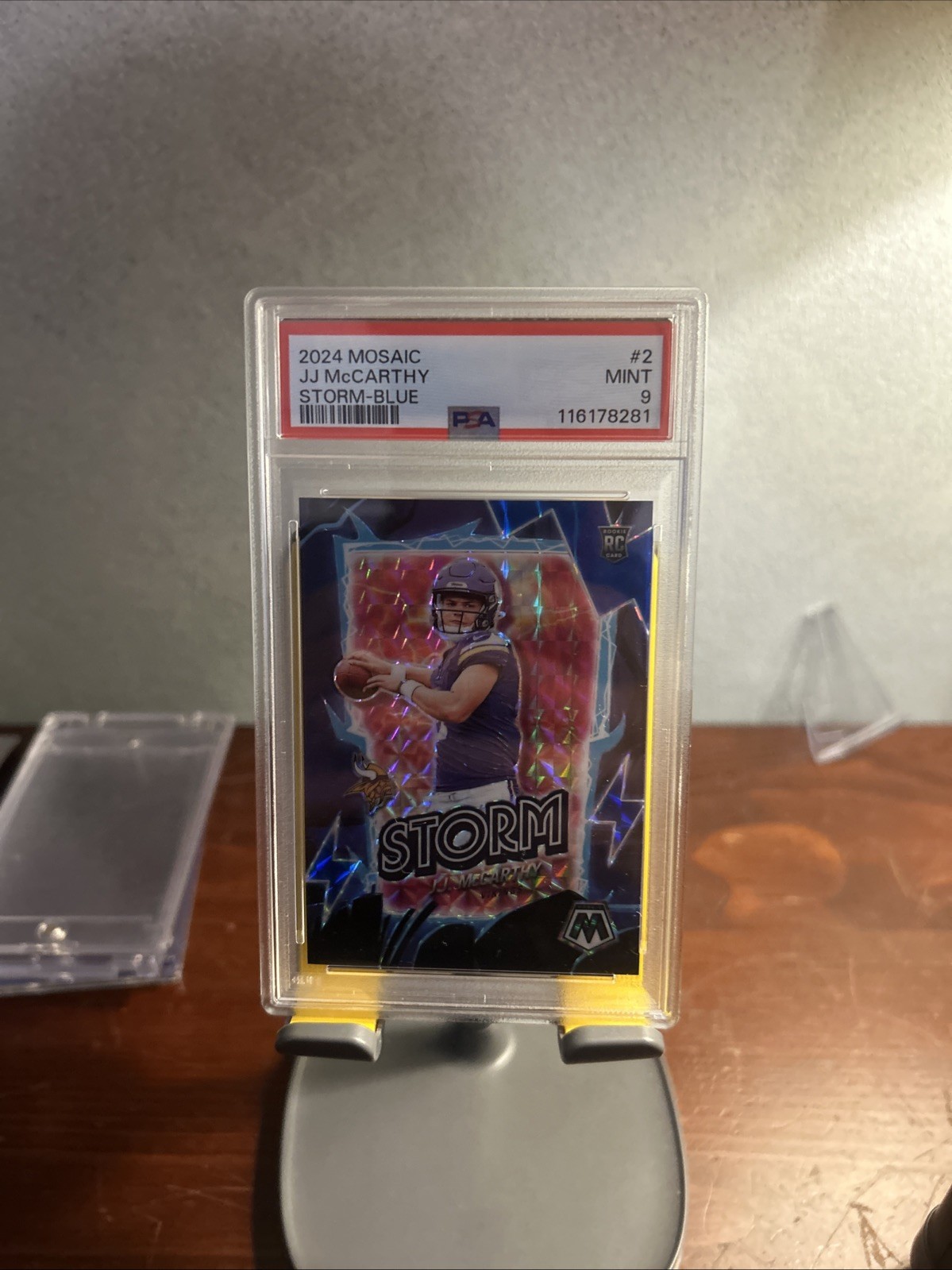 2024 Panini Mosaic - Storm J.J. McCarthy #2 Blue Mosaic Prizm /99 (RC)