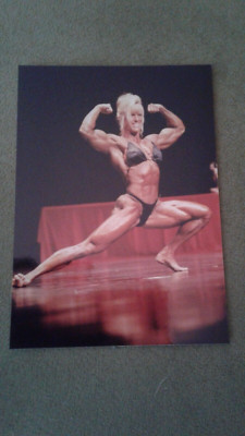 Photo of Female Bodybuilder flexing in Contest 3.5x5-Exc condition