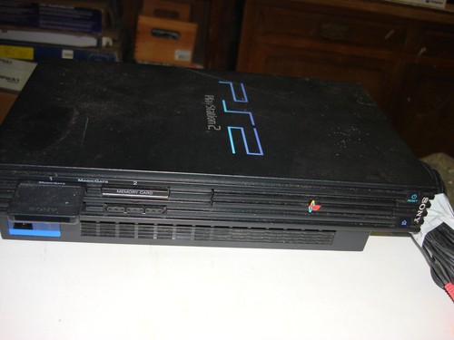 Troc Echange Console Sony PS2 39004 complète + télécommande + 1 jeu sur