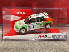 SCX 1/32 Scale Advance Lancia Delta Integrale Totip with lights- E10480X300 New