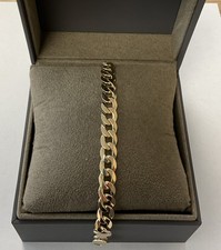 9CT GOLD CURB LINK BRACELET 8.25 INCH LONG 23.6  GRAMS HALLMARKED