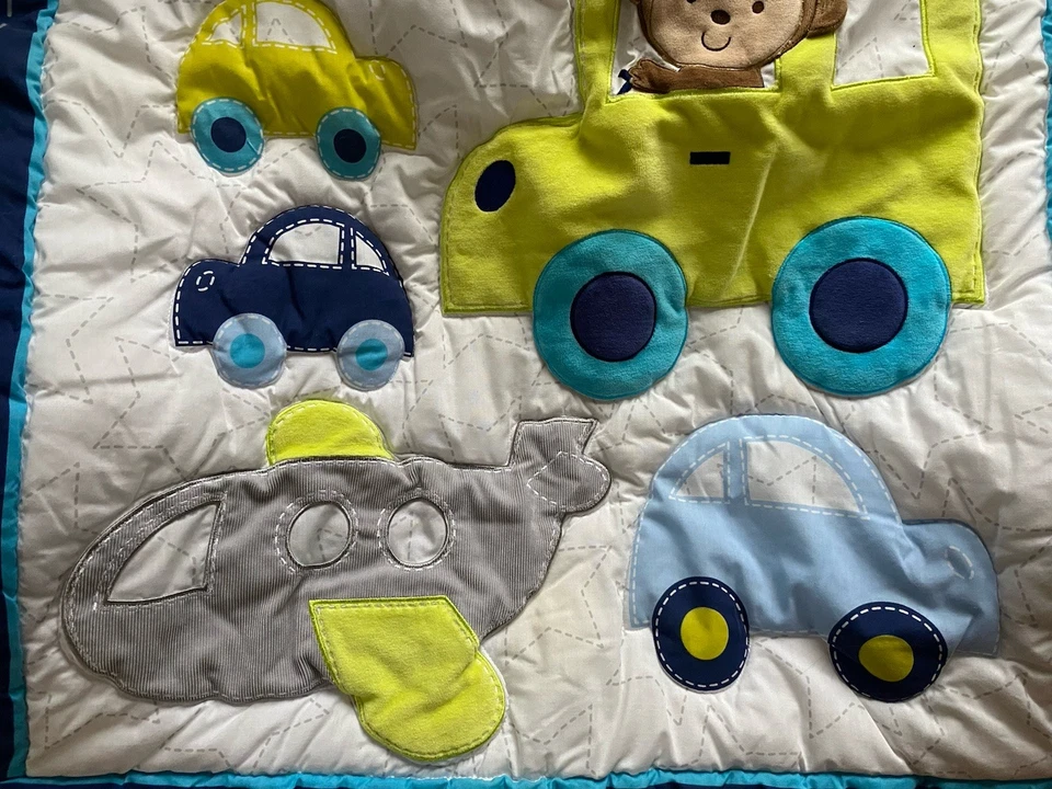 Edredón Carter's Child Of Mine azul verde mono vehículos coches avión cuna Foto 3 de 4