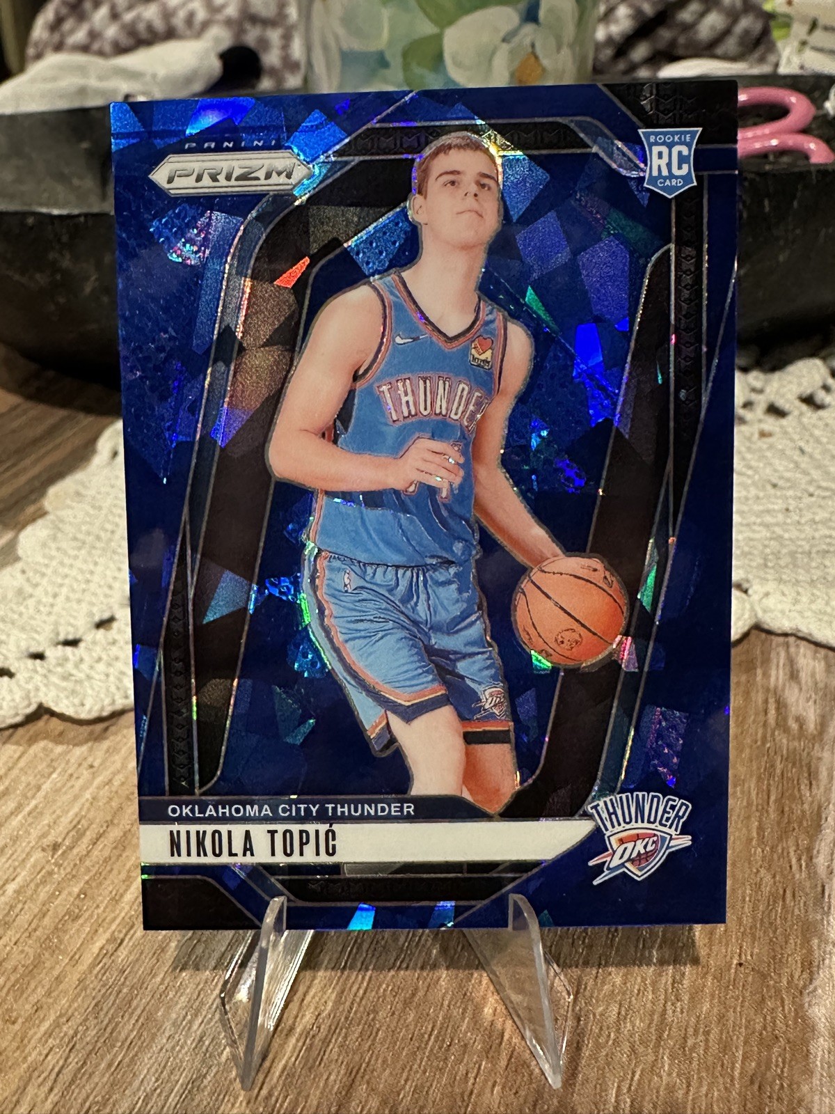 2024-25 Panini Prizm Nikola Topic ROOKIE BLUE CRACKED ICE PRIZM /125 RC #230 OKC