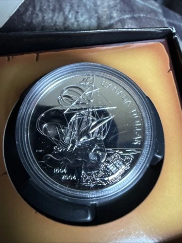 2004 Canadian 400th Anv. First French Settlement BU Silver Dollar