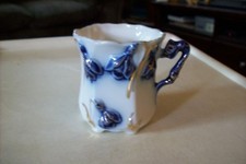 Vintage Miniature Porcelain Demitasse Cup With Blue Flower Decoration