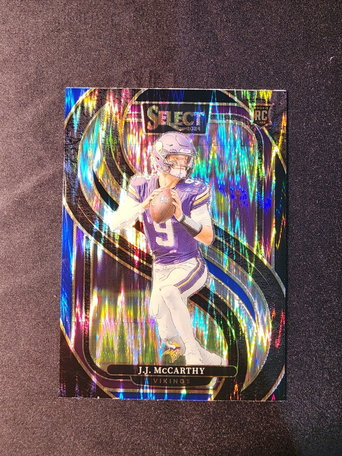 2024 Panini Select - Premier Level JJ McCarthy #134 Black & Blue Shock Prizm(RC)