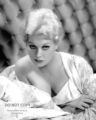 Kim Novak posing in a bra Photo Print (8 x 10