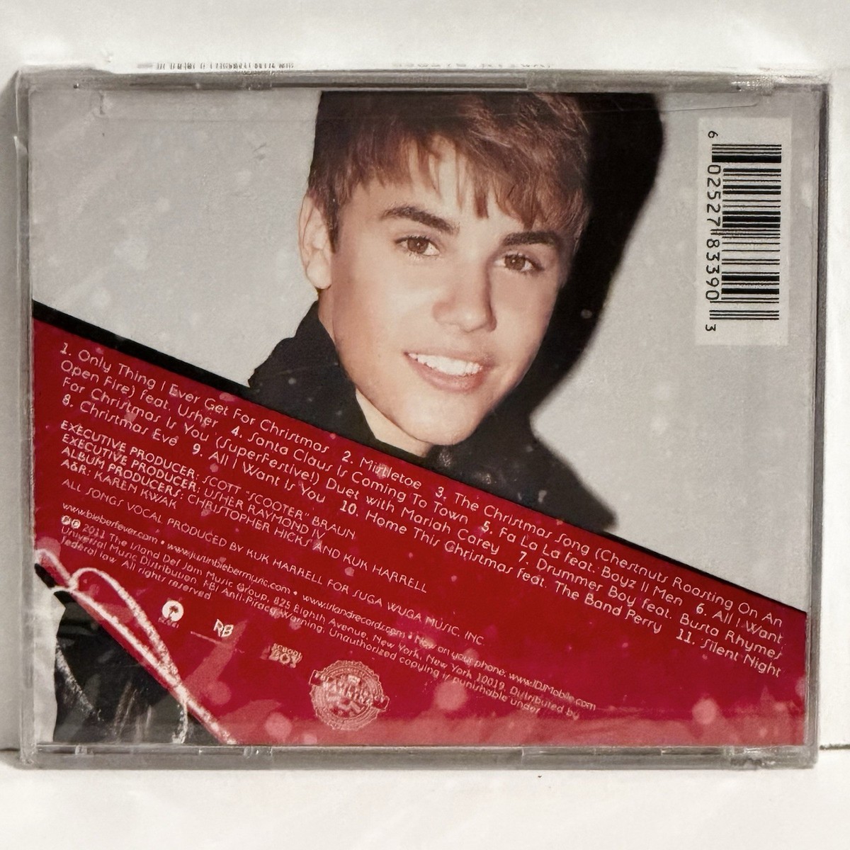 Factory Sealed (shrink wrapped) Under the Mistletoe by Justin