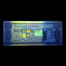 Guyana 20 Dollars Note. Great Currency Under UV Art Light. Waterfall Paper Money