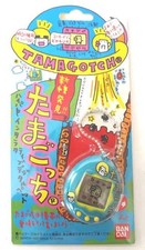 BANDAI New species discovered Tamagotchi blue x logo 