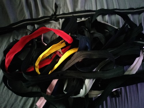 nearly 3 pounds of  gently used 14" to 17" long ZIPPERS