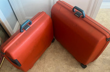 Pair of orange vintage SAMSONITE hard Shell Suitcases Two-Wheeled