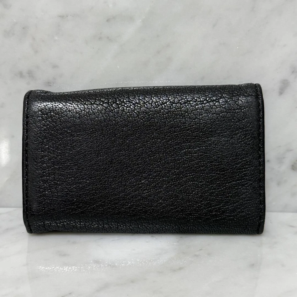 Estuche para llaves Diesel para hombre de cuero genuino negro 6 filas 6,5x10,6 cm compacto de lujo pequeño Foto 2 de 4