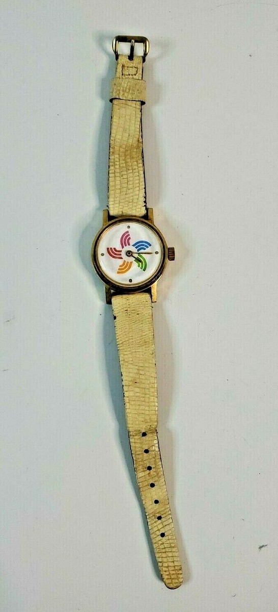 Vintage AVON LeJour Time Co Pinwheel Wristwatch Ivory Leather Band Watch Vintage 79 Le Jour Color Wheel Watch Avon Excellent Working  main image 2