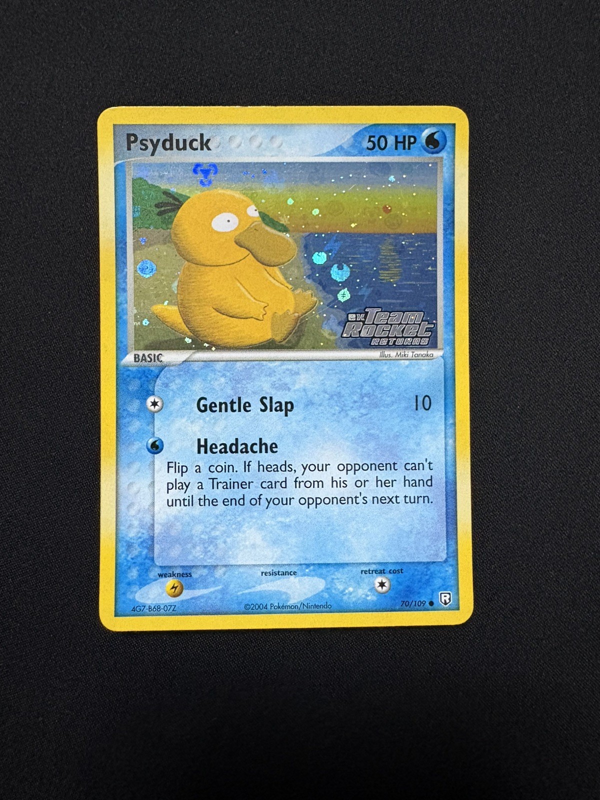 Psyduck 70/109 Team Rocket Returns Reverse Holo NM