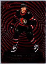 25-26 UPPER DECK FLUORESCENCE RED - DONOVAN SEBRANGO #F-22 SENATORS