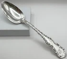 WHITING STERLING SILVER ANTIQUE SERVING SPOON IN LOUIS XV (1891) PATTERN