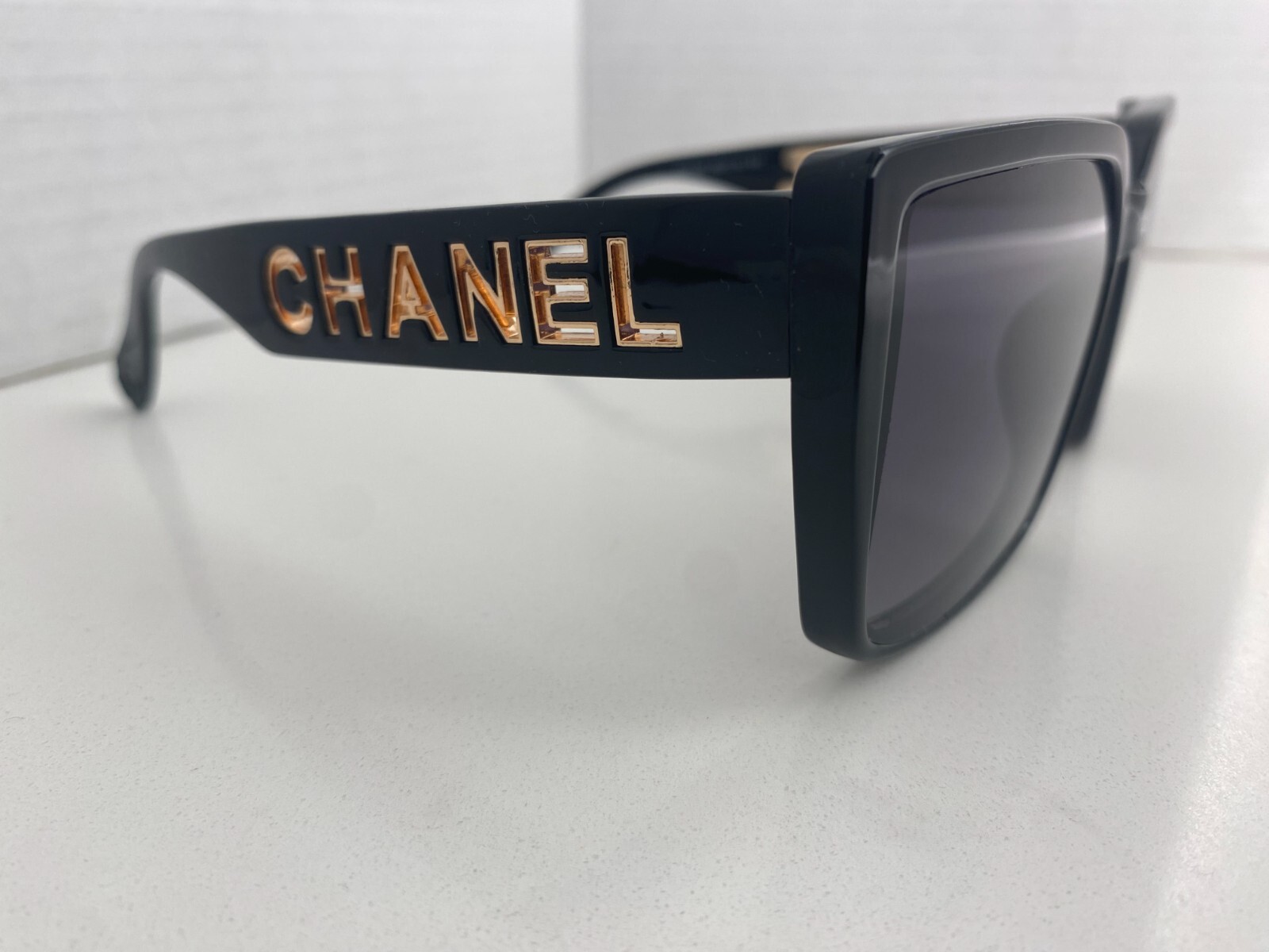 Chanel Black Sunglasses with Full Logo Design