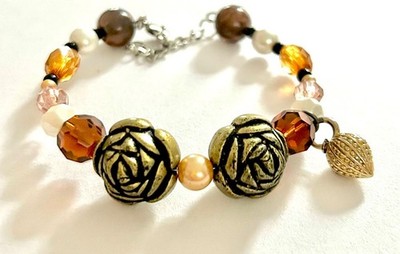 Armband braun orange Kristall schwarz gold roseweiße Perlen Handarbeit