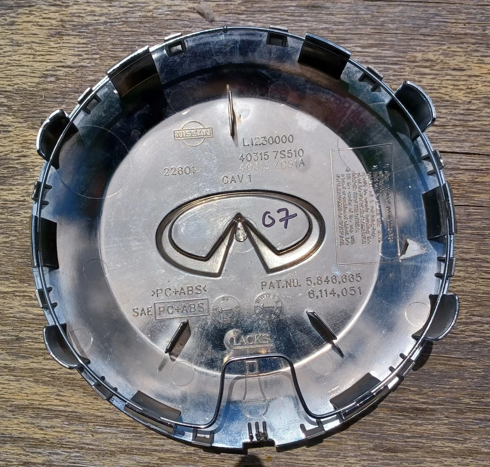 Tapa central Infiniti QX56, cromo, 2004-2007 pieza # 40315 7S510, 40315 ZC51A 07 Foto 3 de 3