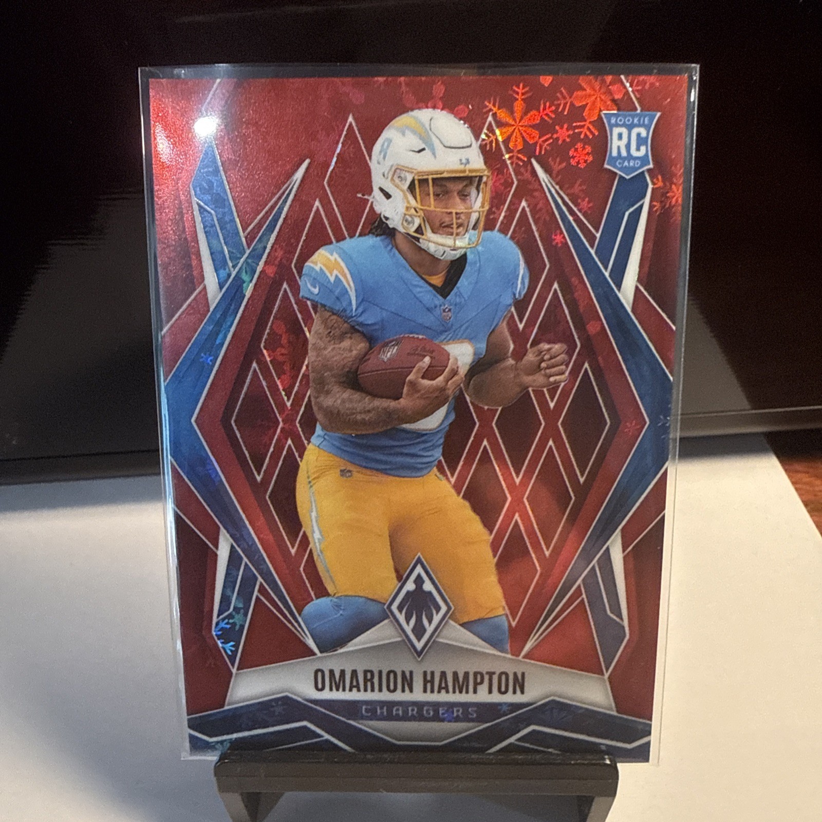 2025 Panini Phoenix - Rookies Omarion Hampton #192 Red Winter /399 (RC)