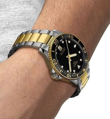 TISSOT HERREN UHR SEASTAR 1000 QUARZ STAHL ZWEIFARBIGES ARMBAND & SCHWARZES ZIFFERBLATT ORIGINAL