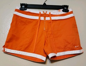 orange nike shorts womens