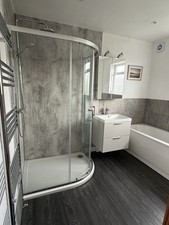 Bathroom Suite with Toilet and Sink radiator