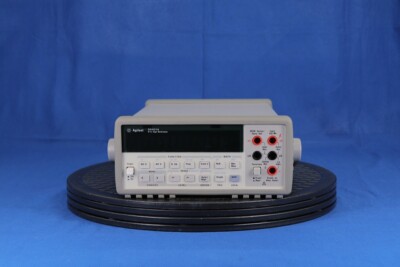 Agilent 34401A  DMM 6 1/2 digits, Agilent label and old style case