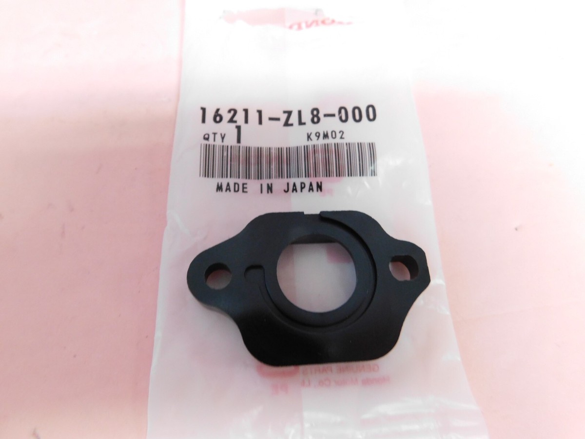 GENUINE HONDA CARBURETOR INSULATOR # 16211-ZL8-000 -- BOX