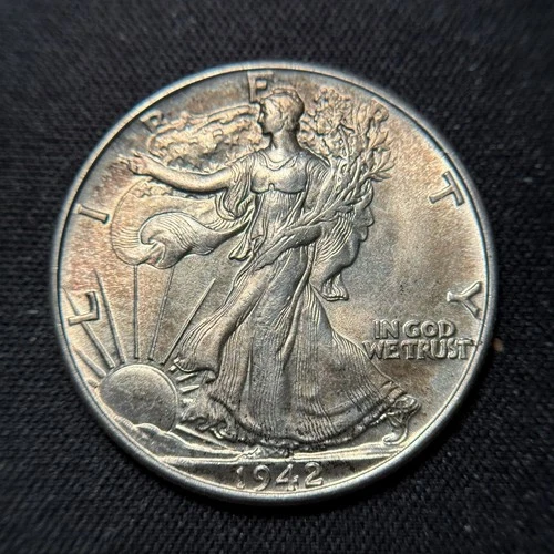 1942 Walking Liberty Half Dollar Uncirculated With Light Color (Planchet Flaw)