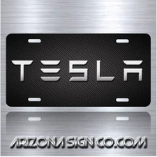 TESLA Inspired Art on Simulated Black Carbon Fiber Aluminum License Plate Tag
