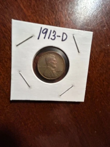 1913-D LINCOLN PENNY AU WITH LIGHT TONING.