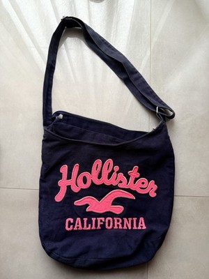 Hollister Schultertasche / Crossbody Tasche - Navy mit pinkem Logo