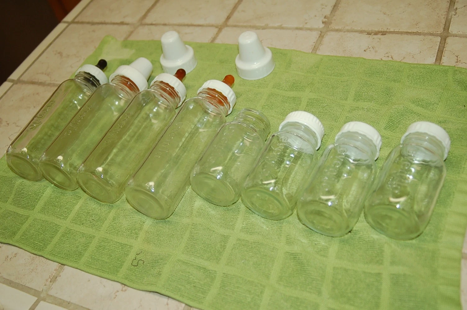 Vintage Evenflo glass baby bottles lot of 8 in 4 oz & 8 oz
