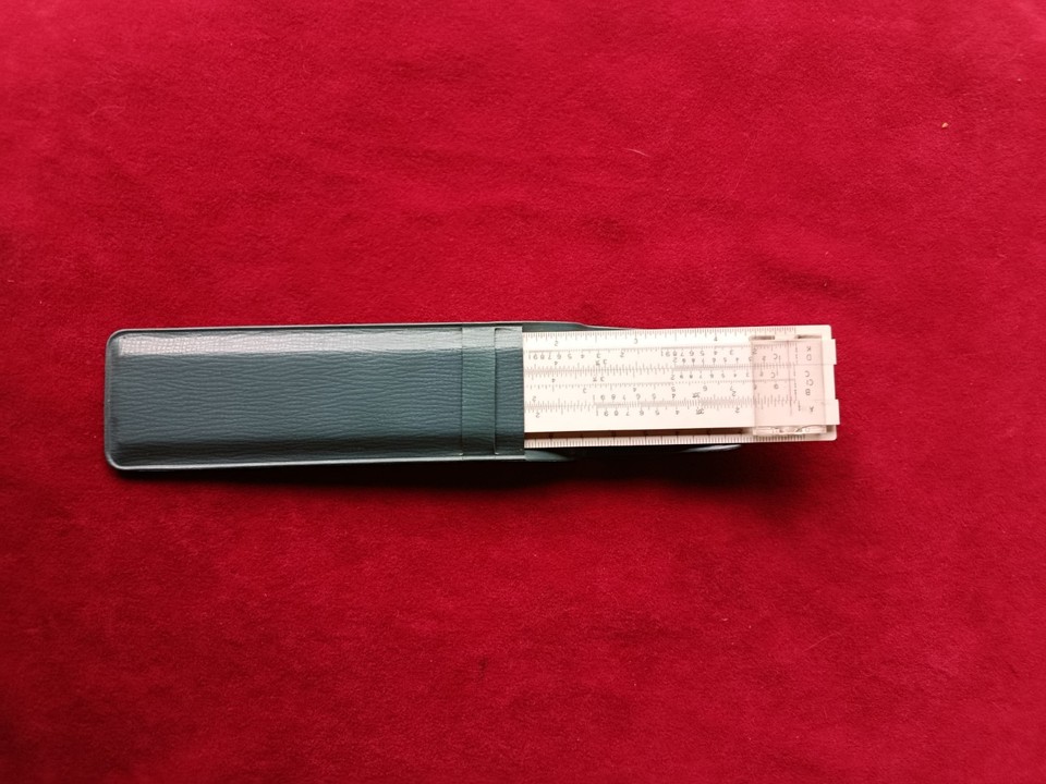 A pocketable piece of pre-calculator history — this tiny Japanese slide rule in its original box is an instant conversation-starter on any desk.