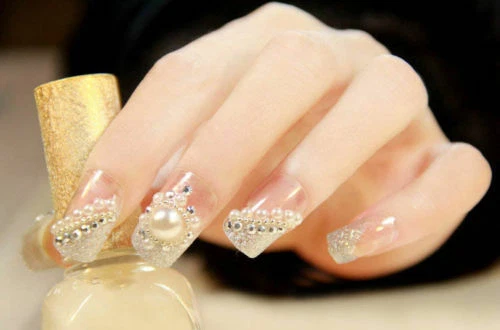 White acrylic nails with gems deals