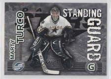 2003-04 Pacific Supreme Standing Guard Marty Turco #5 0a4