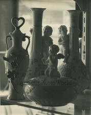 Still life with statuette vases antique art photo