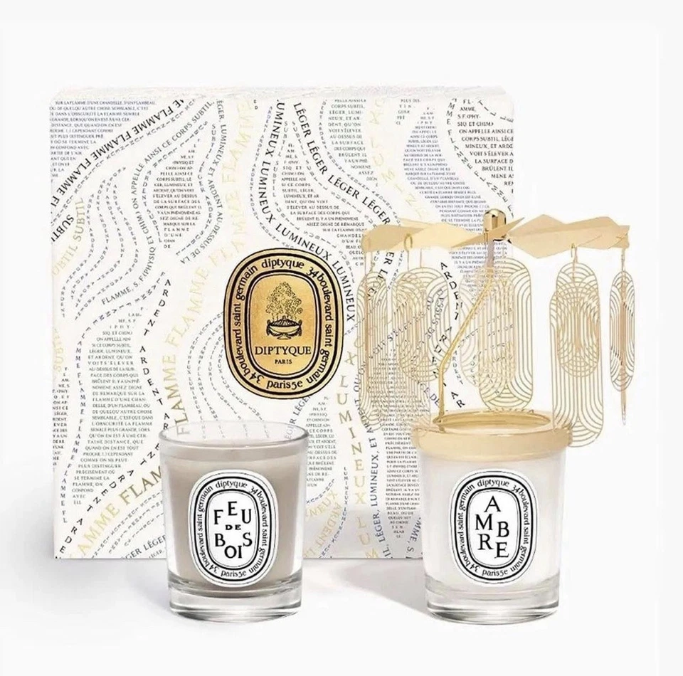 NUEVO JUEGO CARRUSEL DIPTYQUE VELAS AMBRE Y FEU DE BOIS 70g EDICIÓN FESTIVA Foto 2 de 4