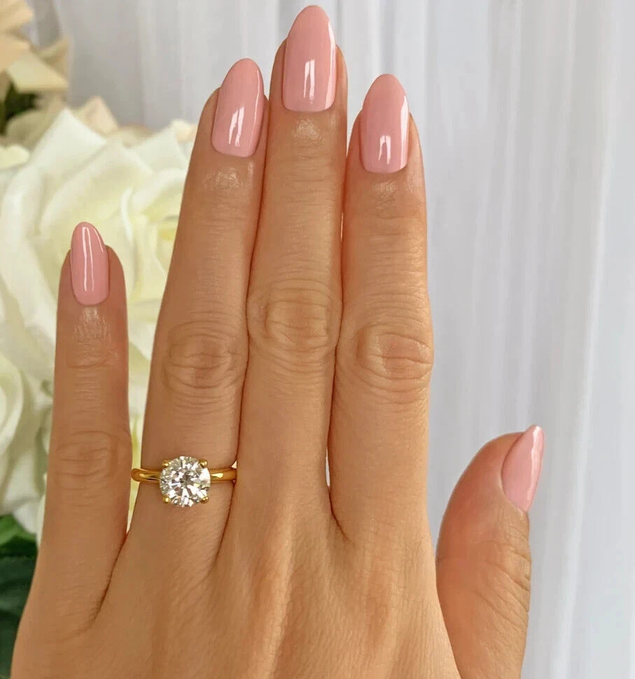 Round diamond hotsell ring gold