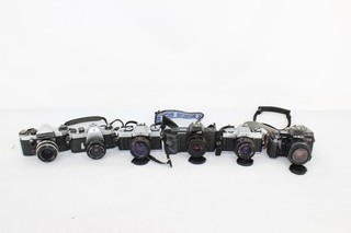 F x6 Vintage SLR Film Cameras Inc Minolta XG 1 Olympus OM 707 Etc