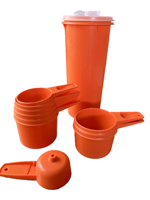 VTG. LOT OF ORANGE TUPPERWARE MEASURING CUPS, STORAGE CONTAINER, MINI FUNNEL