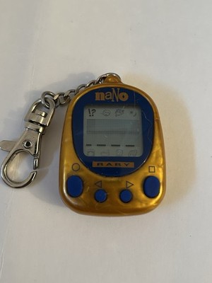 Vintage Rare Nano Baby Tamagotchi Virtual Pet 1997 Playmates Gold