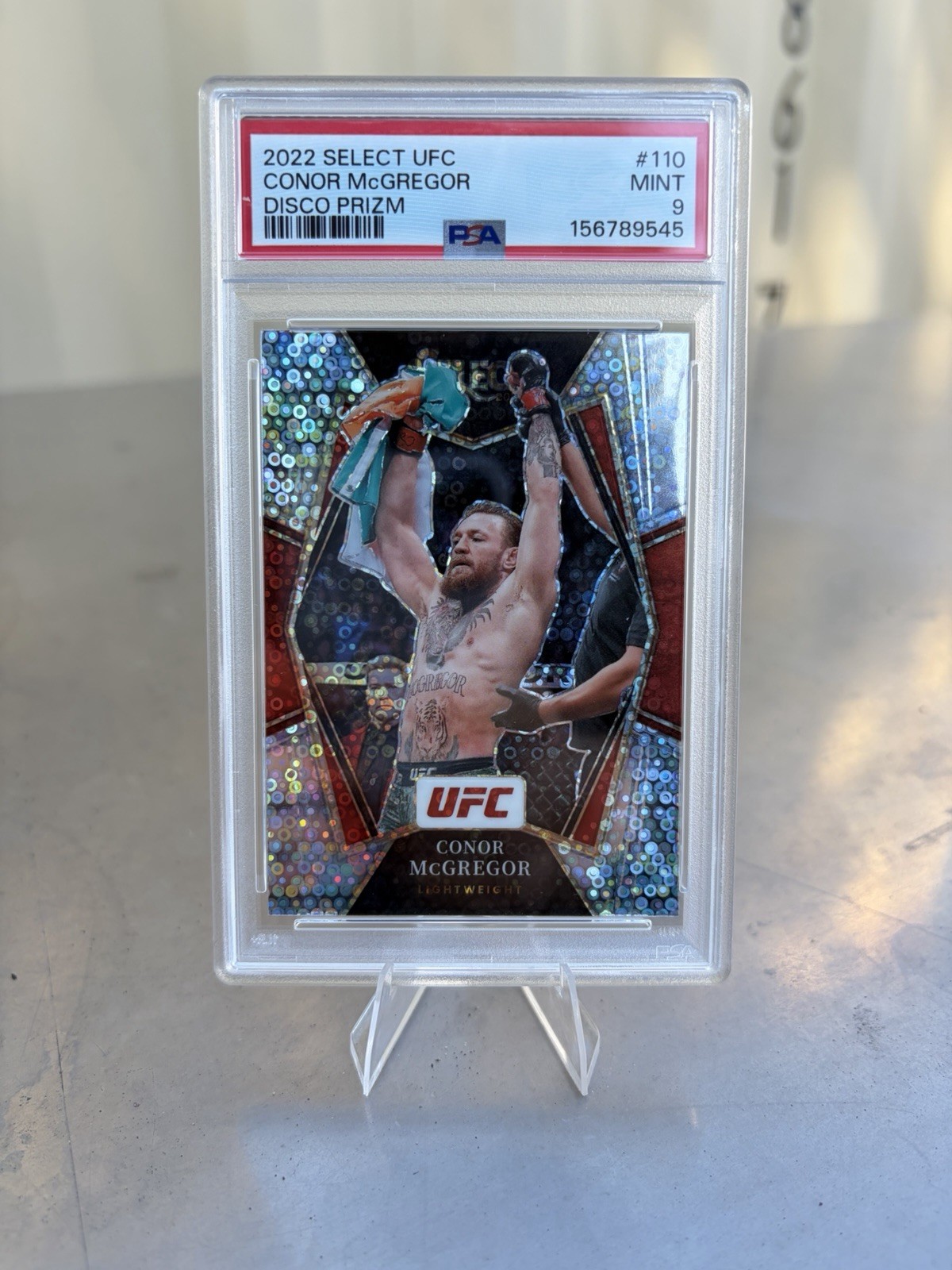 Panini 2022 Select UFC Premier Level Conor McGregor #110 Disco Prizm PSA 9 view 2