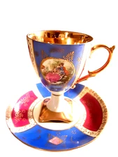 Vintage porcelain coffee cup with saucer in gold pattern France